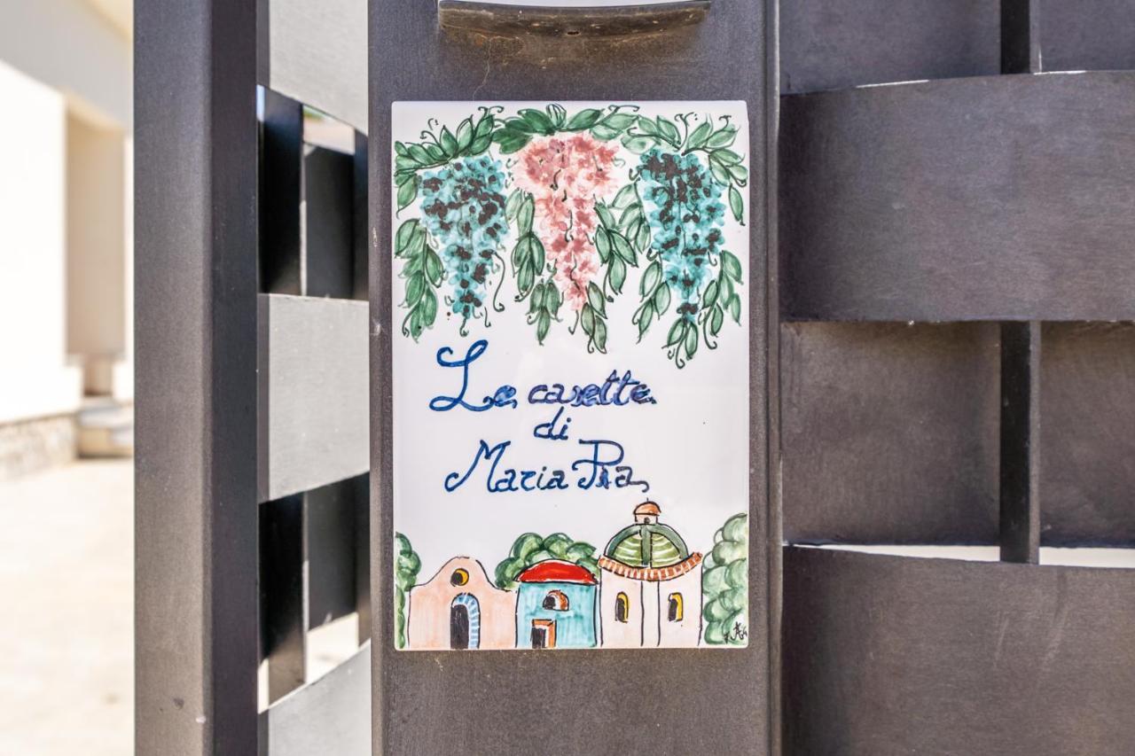 Le Casette Di Maria Pia มอนเดลโล ภายนอก รูปภาพ